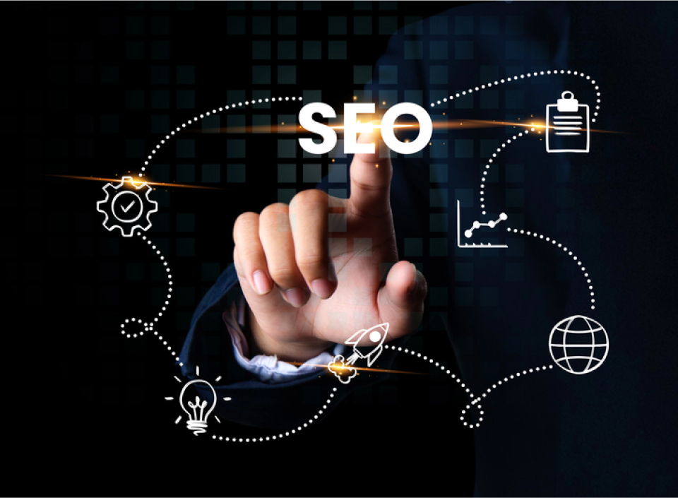 A person’s hand points to the word “SEO” with icons representing settings, ideas, a rocket, growth, a network, and a checklist connected around it.