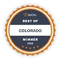 A circular badge with "UpCity Best of Colorado Winner 2023" written in the center, surrounded by an orange and black border.