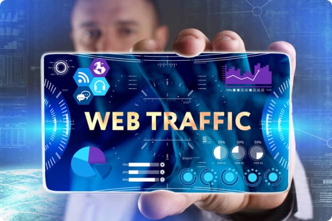 Person holding a transparent screen displaying the words "Web Traffic" with various digital graphs, charts, and analytics icons in a futuristic interface.