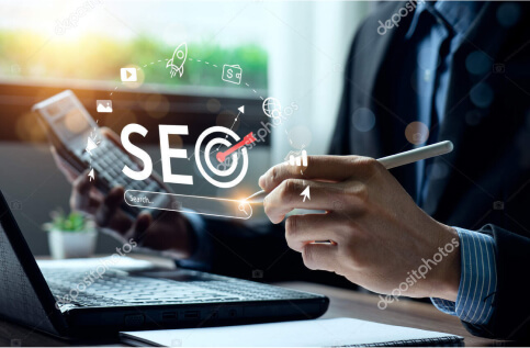 A person in business attire works at a laptop, holding a smartphone, with a digital "SEO" graphic and icons superimposed in the foreground.