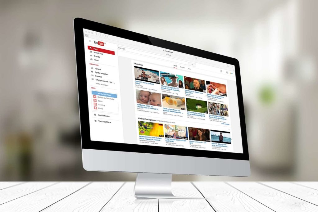 A monitor showing videos with good Youtube SEO content