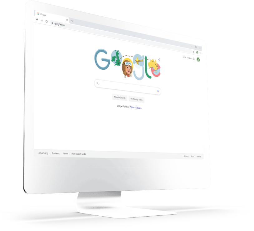 Google Search home page displayed on an iMac monitor