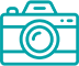 A graphic of a camera on a transparent background