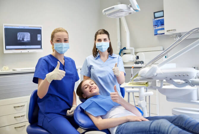 Dentist with Patiens