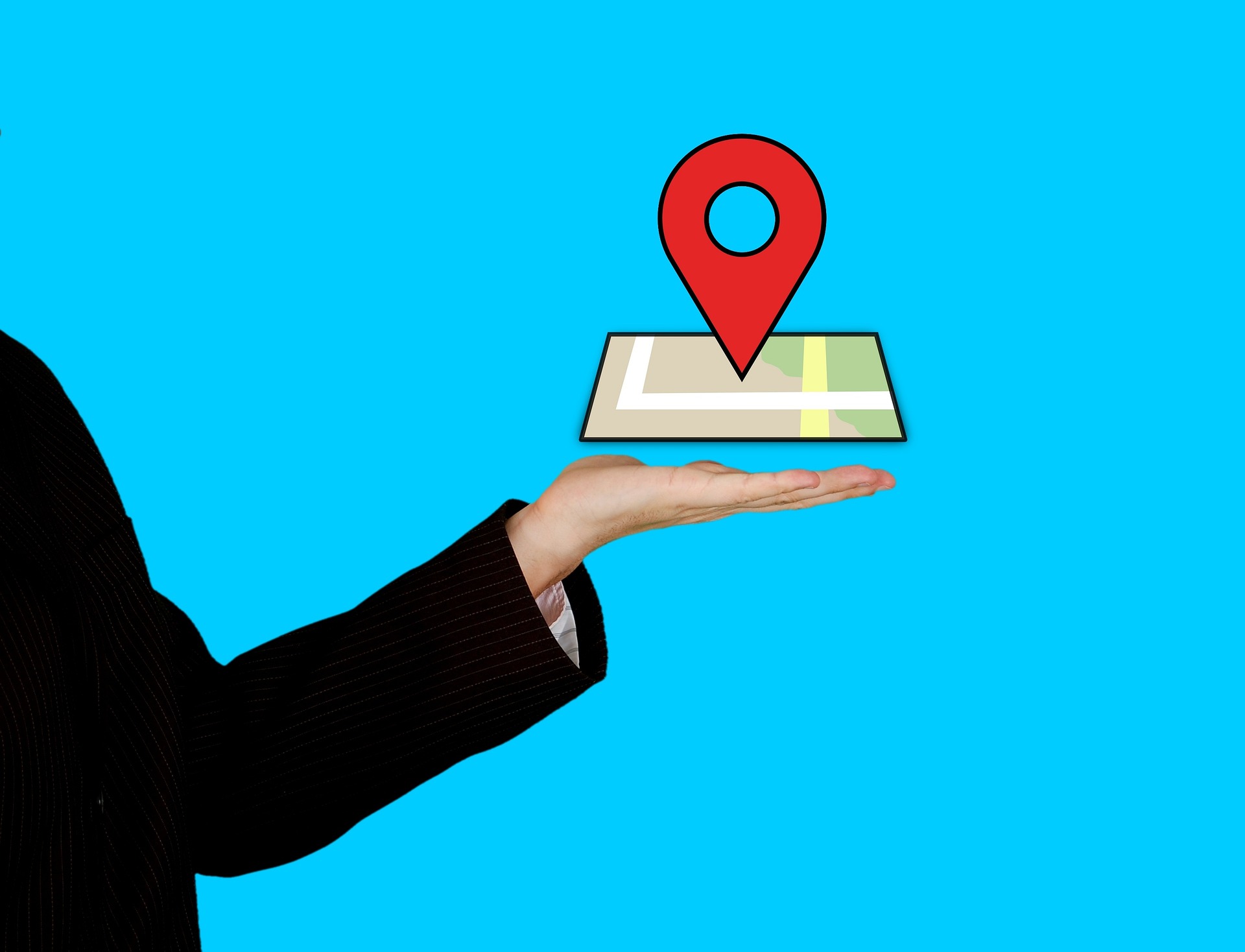 person holding google map with red pin about what is a citation in seo