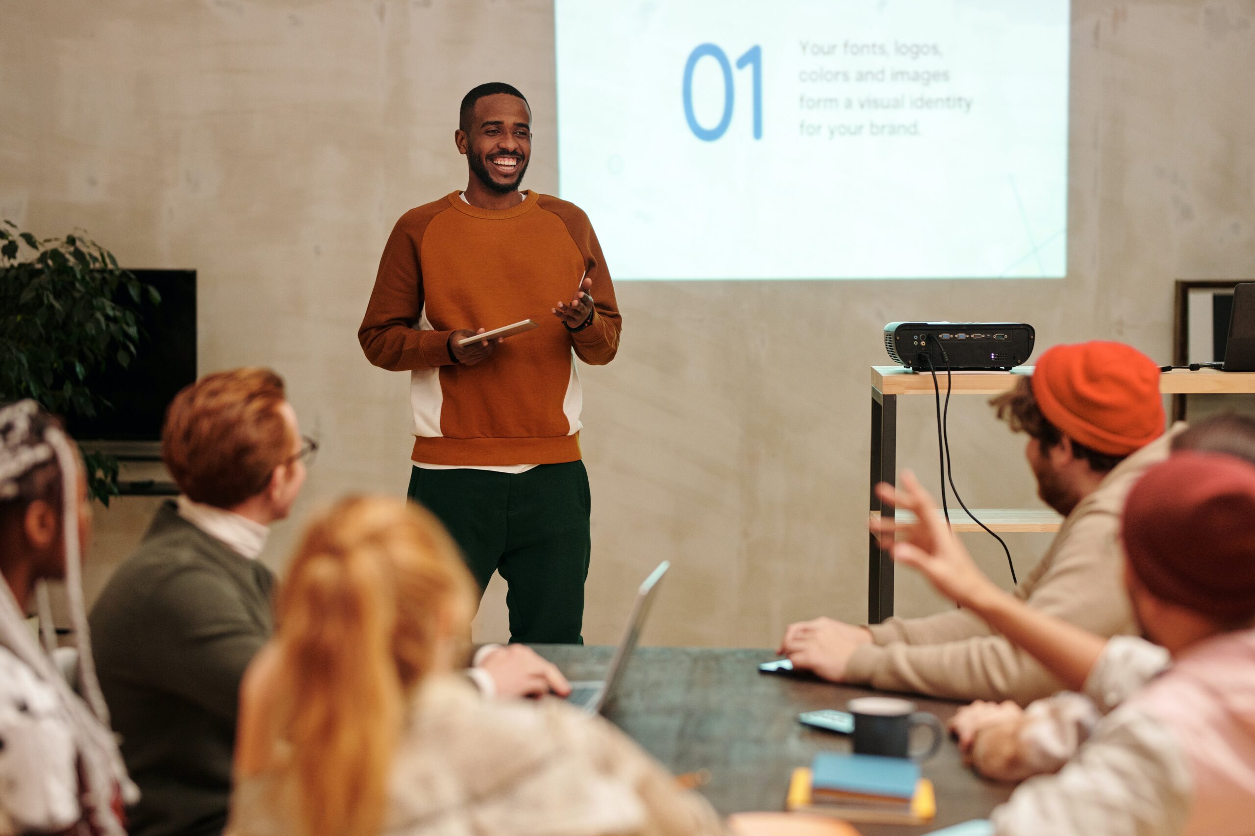 man speaking in front of an audience