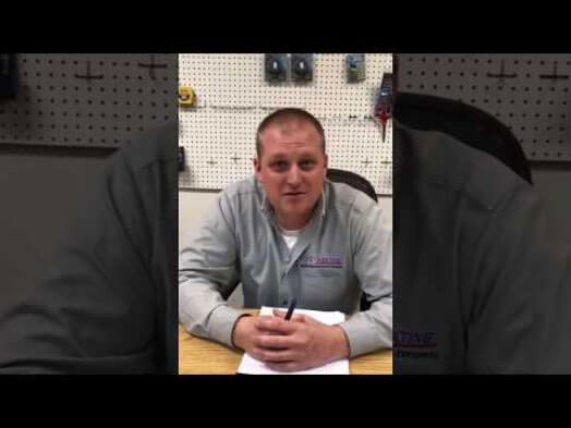 Customer-Review-for-HVAC-SEO-search-engine-optimization-for-Epidemic-Marketingjpg | Epidemic Marketing Man in a gray work shirt sits at a desk with a notepad and pen, looking at the camera. Pegboard with tools is visible in the background.